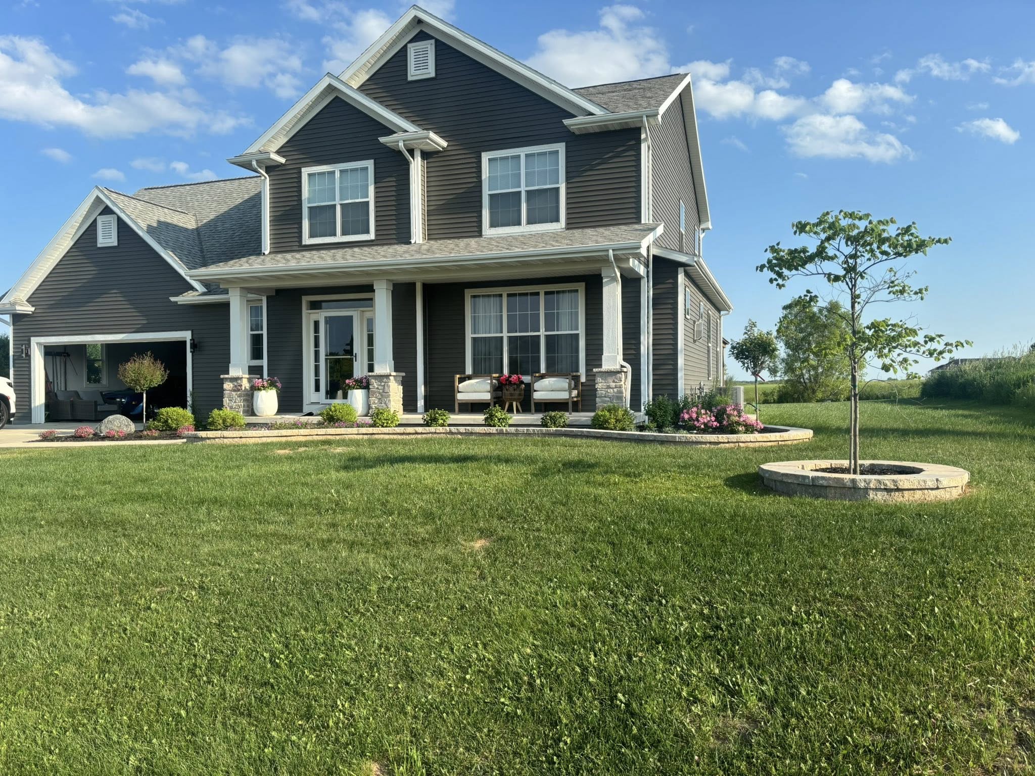 Fresh mulch bed with trimmed shrubs