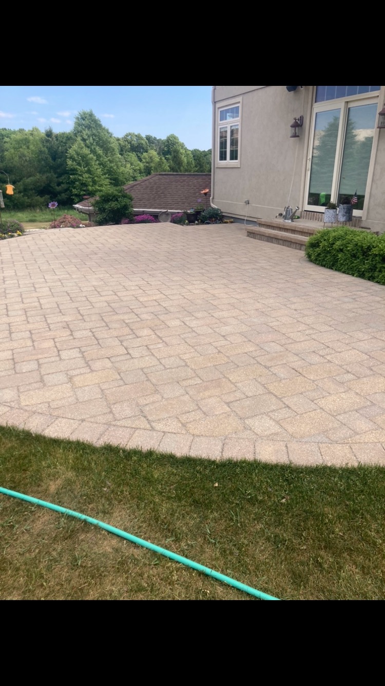 Finished concrete paver patio installed on a residential property in Sheboygan County, Wisconsin