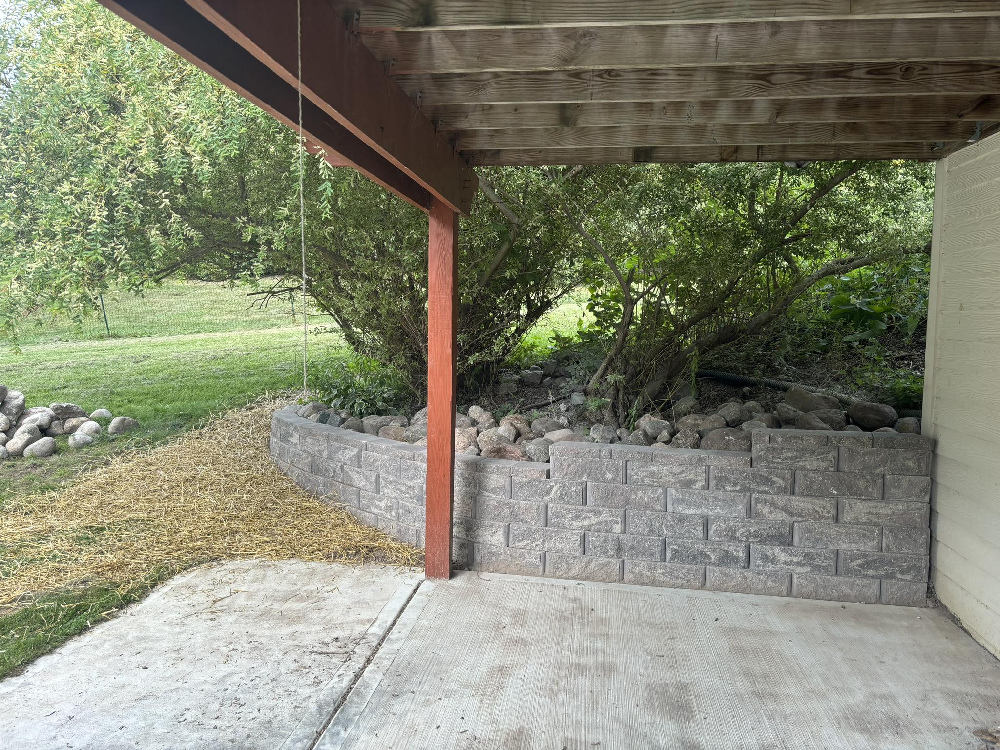 Natural stone retaining wall installation in Sheboygan County, WI